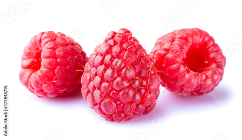 Ripe raspberries macro close up isolated on white background