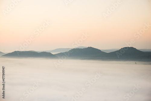 Felsen der Sächsischen Schweiz in Sachsen Deutschland im Nebel zum Sonnenaufgang  © Dominic Wunderlich