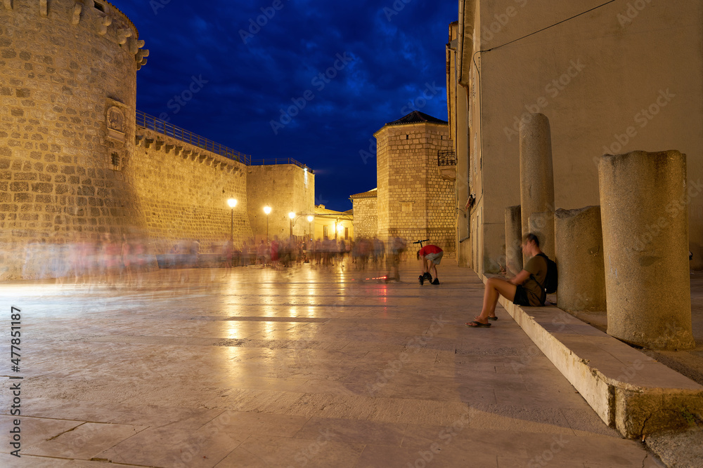 Kamplin square in the historic old town of Krk in Croatia in the evening