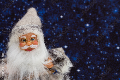 Happy Santa Claus with hat with night sky