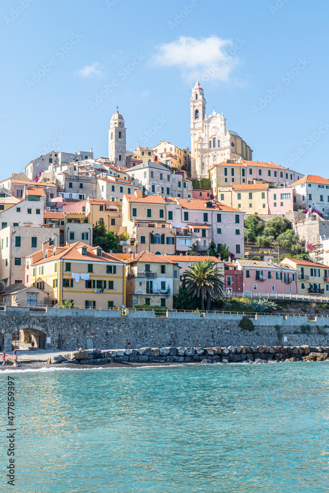 The beach of Cervo with his beautiful historic center in background