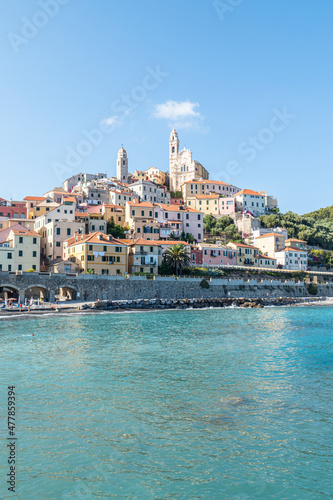 The beach of Cervo with his beautiful historic center in background
