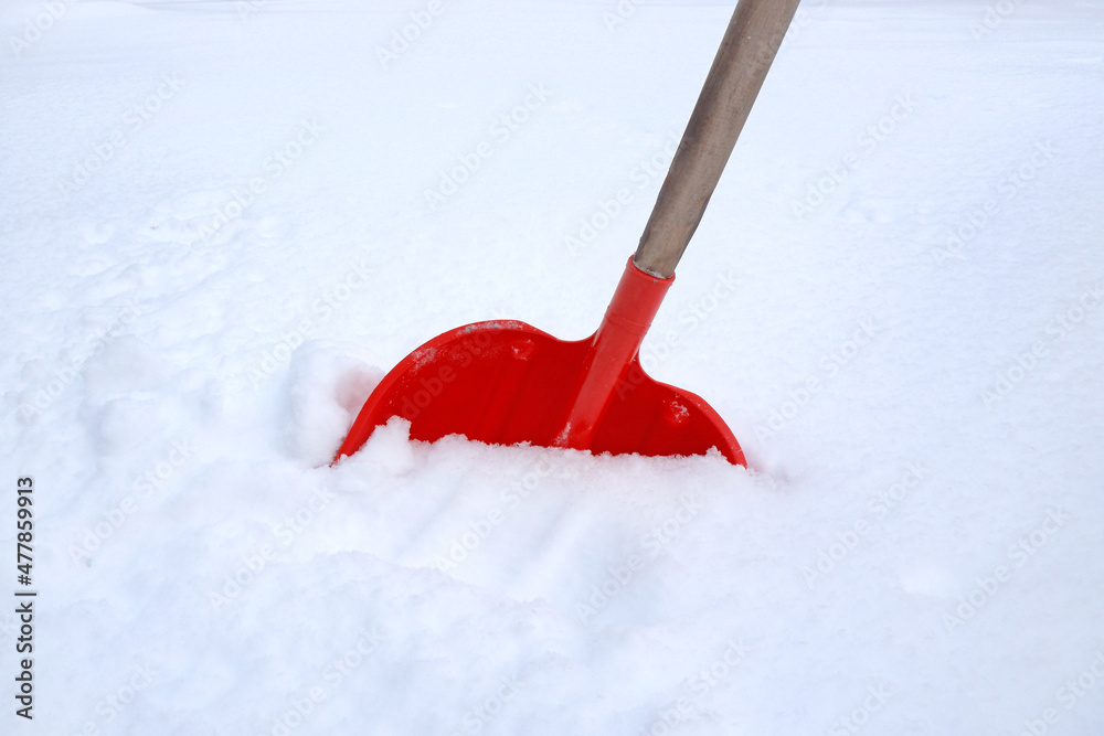 Fototapeta premium snow shovel in snowdrift