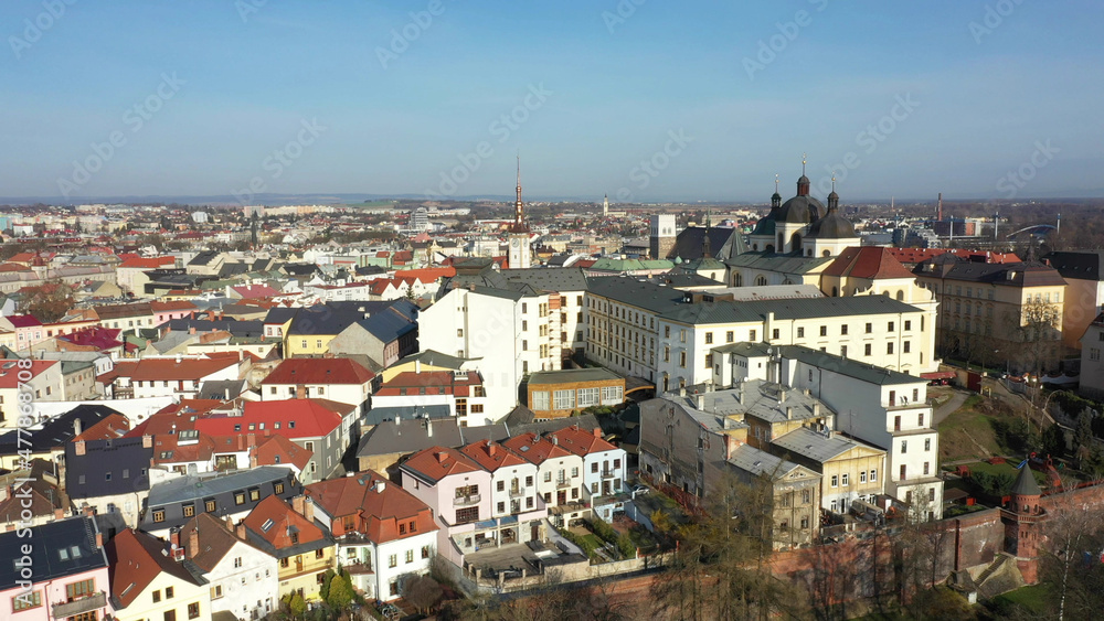 Historical aerial city Olomouc, drone aerial video shot view panorama from the tower of the Gothic church of St Moritz, city town hall Olomouc Gothic building, baroque Church of St Michael