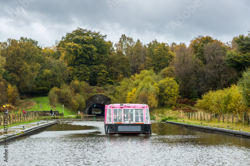 The Falkirk Wheel is a rotating boat lift in Falkirk, Scotland, connecting the Forth and Clyde Canal with the Union Canal. photo