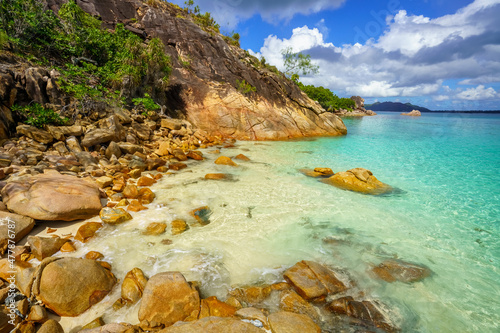 tropical beach on curieuse island on the seychelles