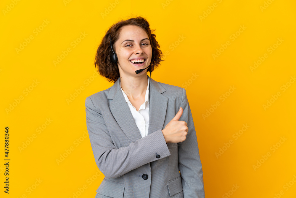 Young English woman isolated on yellow background proud and self-satisfied Young English woman isolated on yellow background proud and self-satisfied