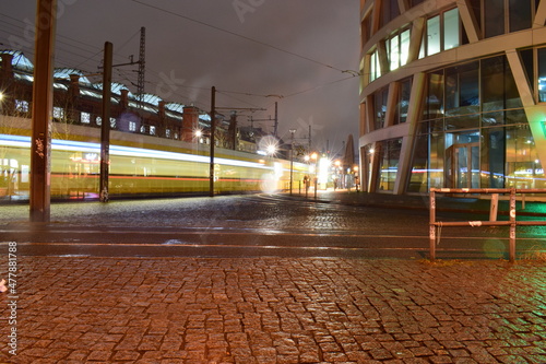 Berlin Hackescher  Markt. Langzeitbelichtung mit einer Straßenbahn.  photo