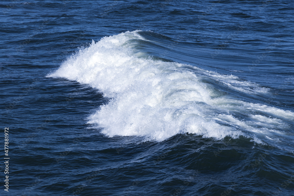 Stormy sea view, deep blue water surface with wave and foam Stormy sea view, deep blue water surface with wave and foam