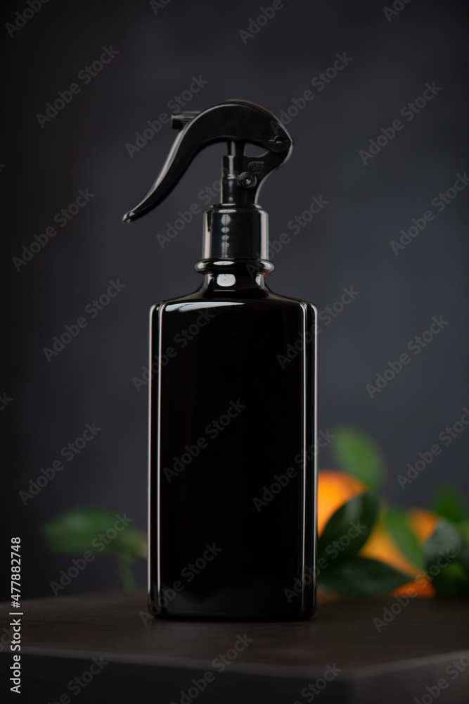 Air freshener bottle on a black background Air freshener bottle on a black background