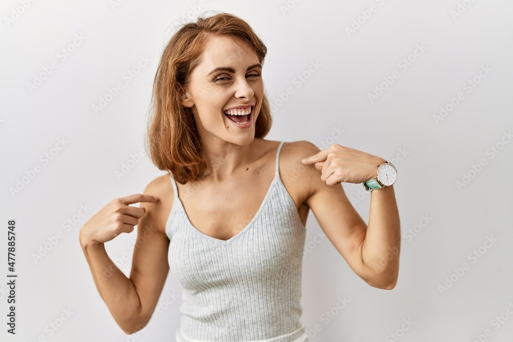 Beautiful caucasian woman standing over isolated background looking confident with smile on face, pointing oneself with fingers proud and happy. Beautiful caucasian woman standing over isolated background looking confident with smile on face, pointing oneself with fingers proud and happy.