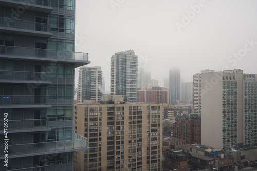 Panoramic Urban City View of a Metropolitan City during Misty and Cloudy Weather