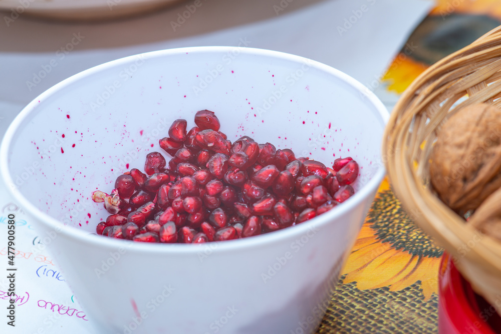 peeled pomegranate in plastic container peeled pomegranate in plastic container