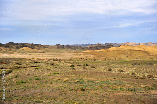 The boundless natural scenery of the Gobi Desert grassland and pasture in Xinjiang, China