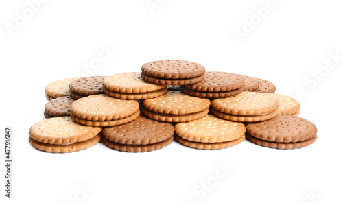 Different tasty sandwich cookies on white background