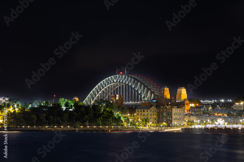 Sydney Harbour Bridge New Years Eve fireworks, colourful NYE fire works lighting the night skies with vivid multi colours © Elias Bitar