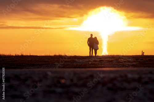 couple in love and atomic explosion