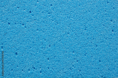 Blue pumice texture, background, macro, close-up, top view. Volcanic pumice stone close-up, background, texture, top view. Porous pumice stone surface, macro, texture, background.