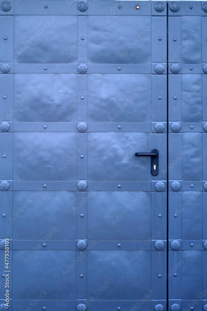 ancien blue door in the old town with a wooden gate ancien blue door in the old town with a wooden gate