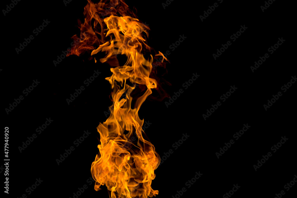 Fire on black background. Fiery patterns. Burning flame. Blazing fire. Flaming patterns and abstract smoke. Concept, idea, project.