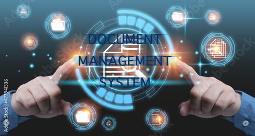 Business, Technology, Internet, and network document management system concept. The virtual online database manages files. Hands man touching on document icon corporate data management system.