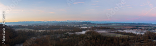 Panorama on the chain of the Pyrenees at sunrise, from Clermont le Fort, in Haute Garonne, Occitanie, France © FredP