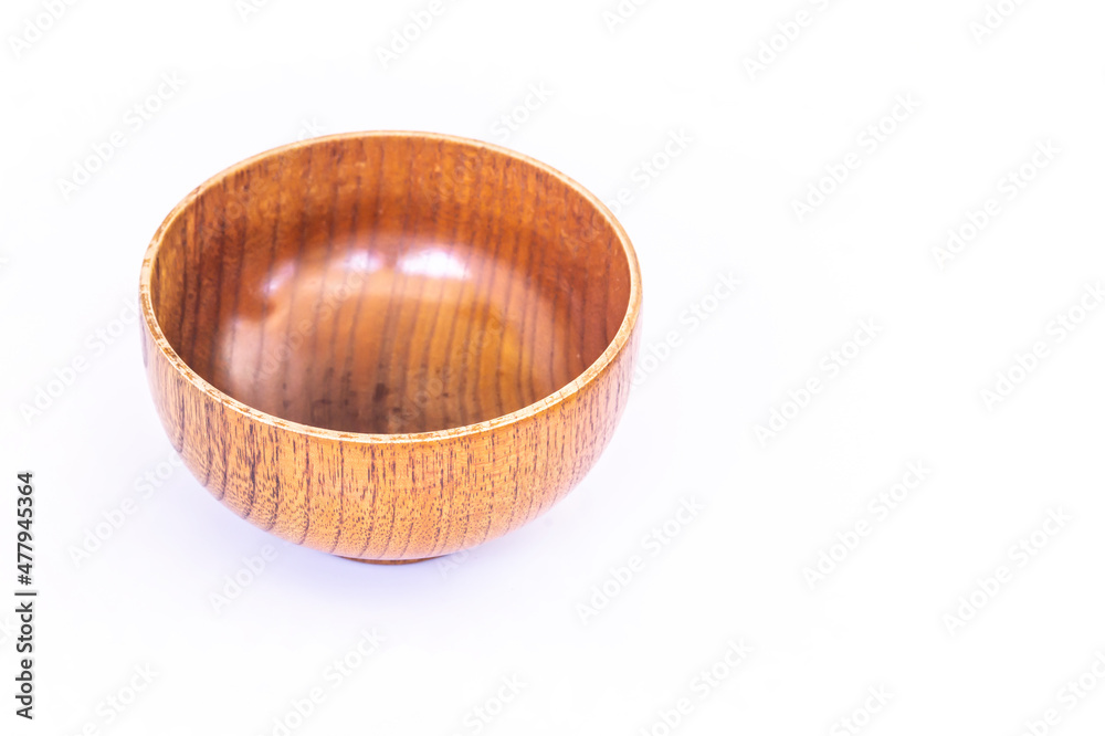 beautiful wooden cup placed on a white background, empty cup for food
beautiful wooden cup placed on a white background, empty cup for food