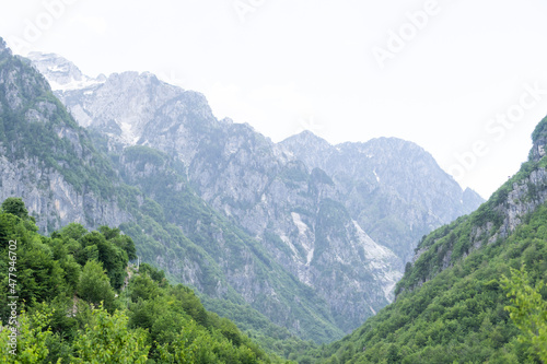 Mountain landscape with houses and farms in Theth in the Albanian alps © Angelov