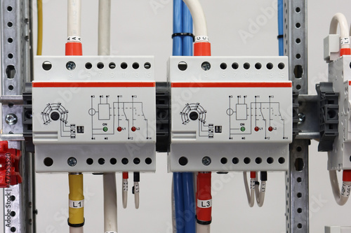 The electric phase current control module is located in the electrical panel