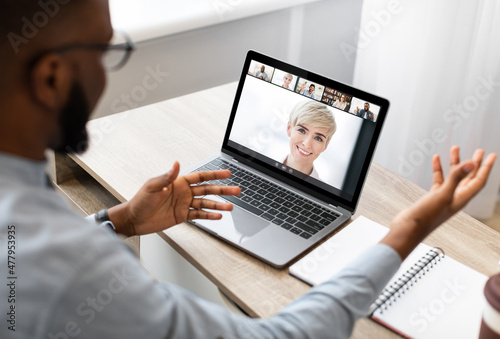 Diverse business people making online briefing videocall at home