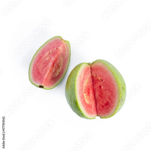 Common guava fruit cut isolated on white background photo