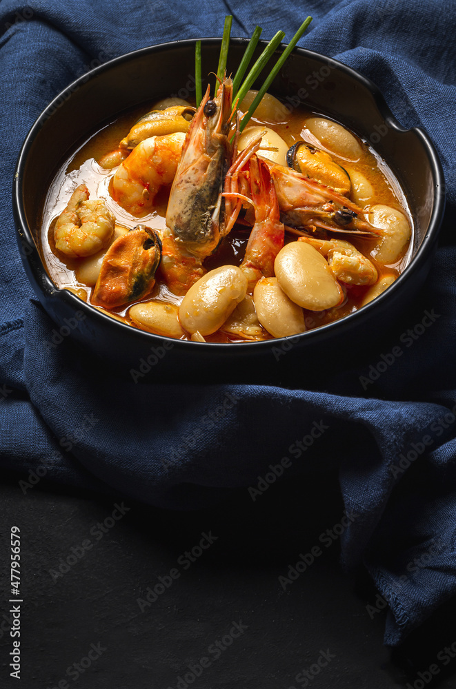 Homemade bean stew with prawns and mussels Homemade bean stew with prawns and mussels