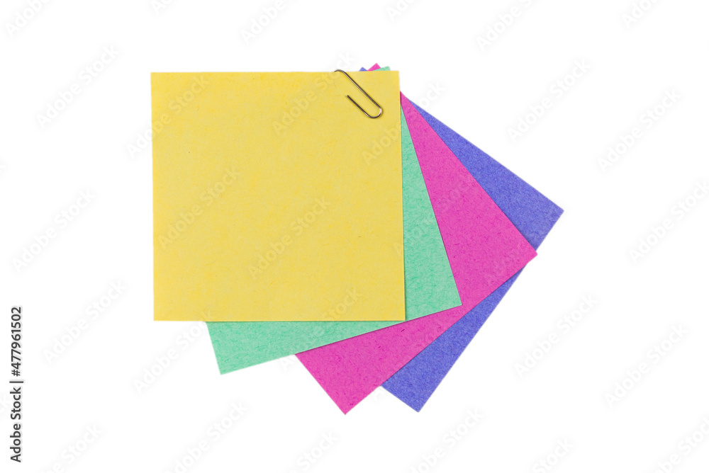 A sticker and a paper clip isolated on a white background A sticker and a paper clip isolated on a white background
