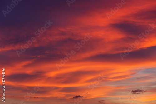 Red and orange clouds - beautiful colorful sunset © Marius Faust
