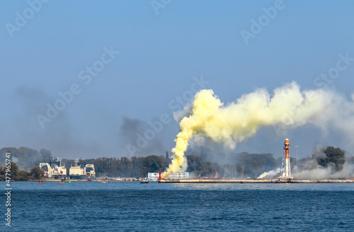 Military exercises on the seashore. Smoke screen 