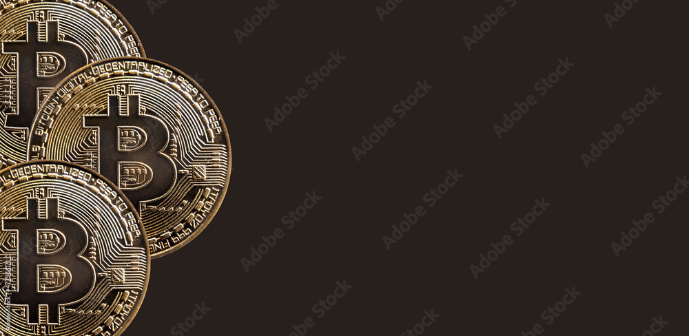 Obraz premium Bitcoins cryptocurrency coins on background with copy space for text. BTC crypto banner.