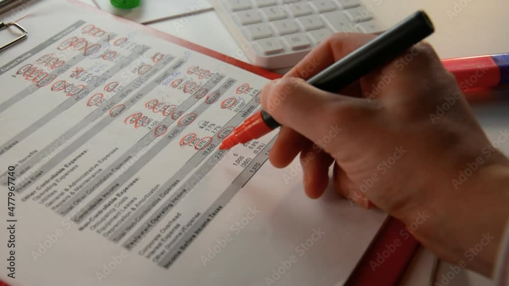 Business man analysis of financial reports close Business man analysis of financial reports close