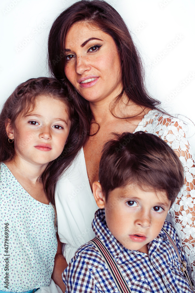 young mother with two children on white background isolated, happy smiling family, lifestyle people concept young mother with two children on white background isolated, happy smiling family, lifestyle people concept