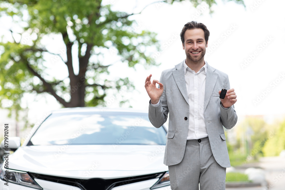 Great choice, salesman giving car key to customer, expert advice on renting and buying auto. Great choice, salesman giving car key to customer, expert advice on renting and buying auto.
