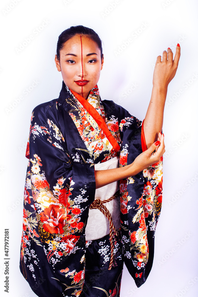 young pretty geisha in black kimono posing isolated on white background, asian ethno young pretty geisha in black kimono posing isolated on white background, asian ethno