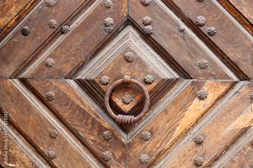 Door knocker of the antique door of old house
