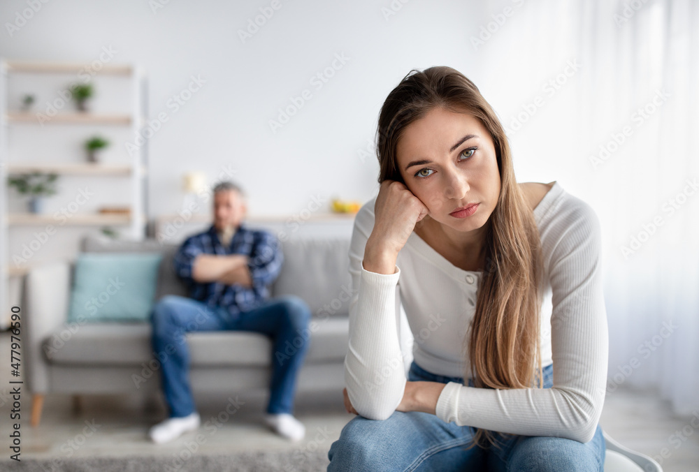 Relationship crisis. Mature woman feeling upset after fight with her husband at home, copy space Relationship crisis. Mature woman feeling upset after fight with her husband at home, copy space