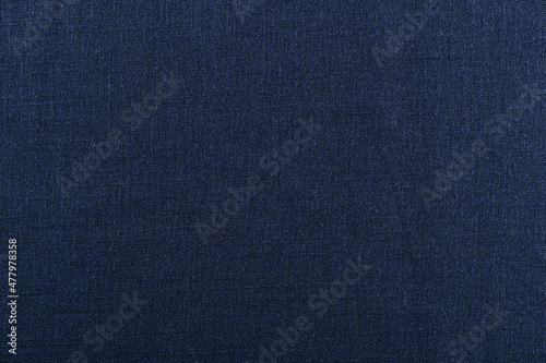surface of dark blue linen fabric, background, texture