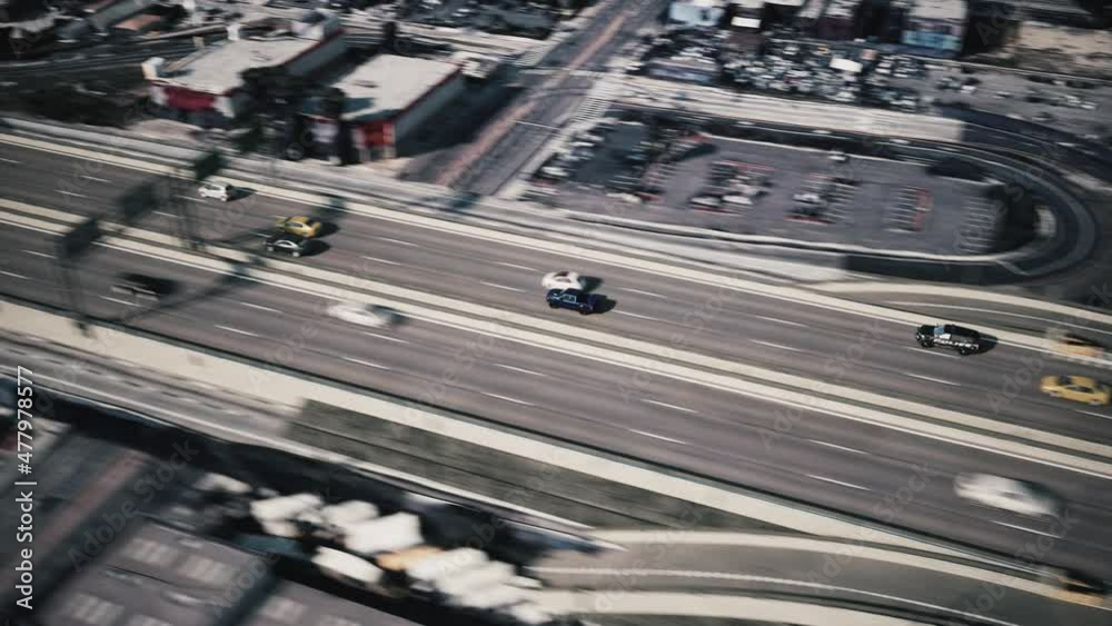 The highway patrol is chasing the fast vehicle. Police helicopter pursuit the car. Police Highway Chase. Aerial view of police pursuit. 3d animation 