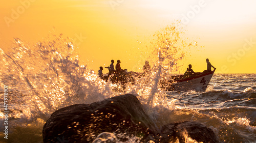 Fishermen returning in the Morning on Lake Malawi photo