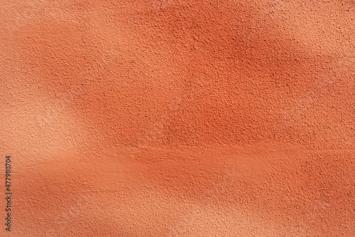 Orange concrete wall with grunge for abstract background.