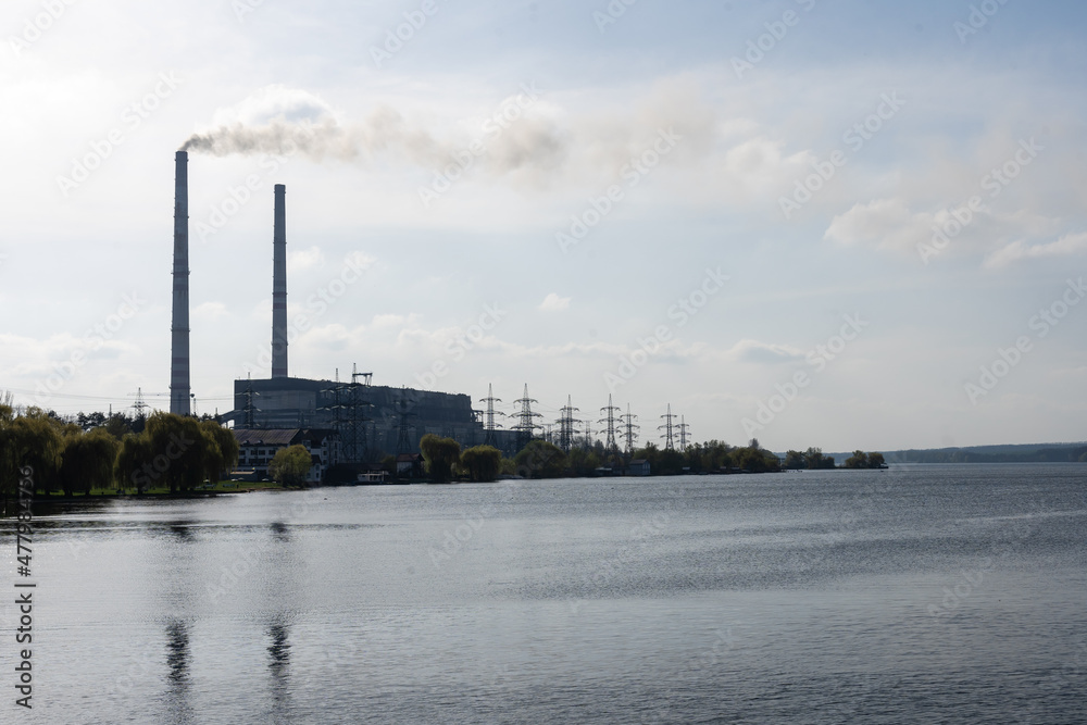 Panoramic view of power station Lukomlskaya Gres. Chimneys with smoke of power plant. Ecological problem. Environmental pollution concept.