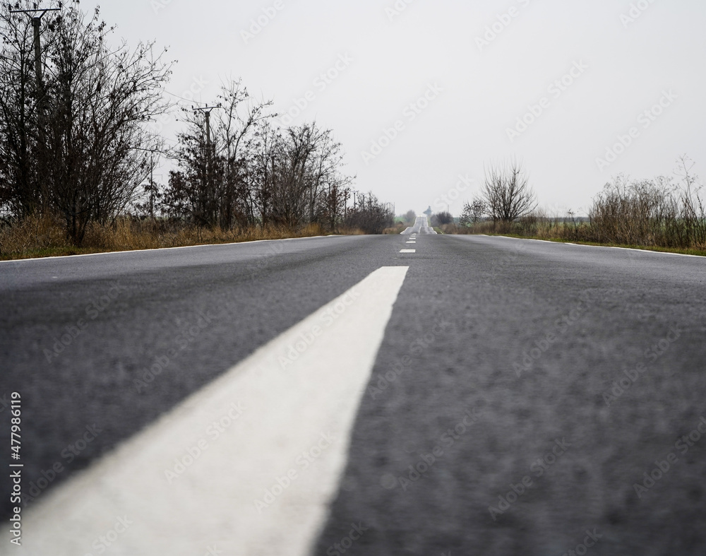 road. it was coming in a straight line for a distance of 20 km. photo during the day. road. it was coming in a straight line for a distance of 20 km. photo during the day.