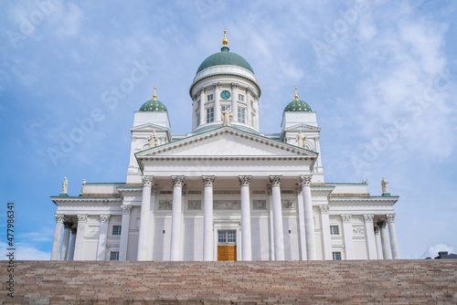 Low angle view of Helsinki Cathedral (Finnish - Helsingin tuomiokirkko, Suurkirkko). The Finnish Evangelical Lutheran cathedral of the Diocese of Helsinki on a sunny summer day.  photo