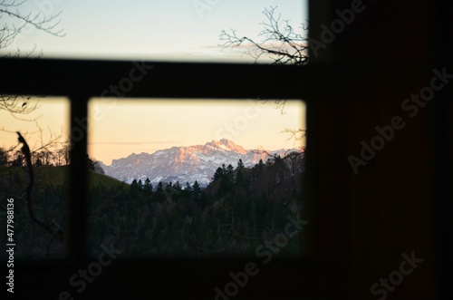 Wallpaper Mural sunset in the mountains. The Säntis mountain in the Appenzell Alps lights up in the last light. snow on the peak. Torontodigital.ca